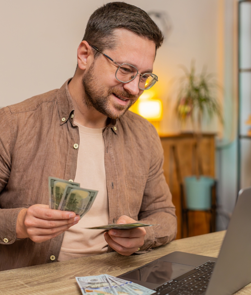Person completing an online loan application